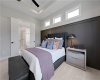Inlaid wall paneling and clerestory windows highlight this serene master bedroom.